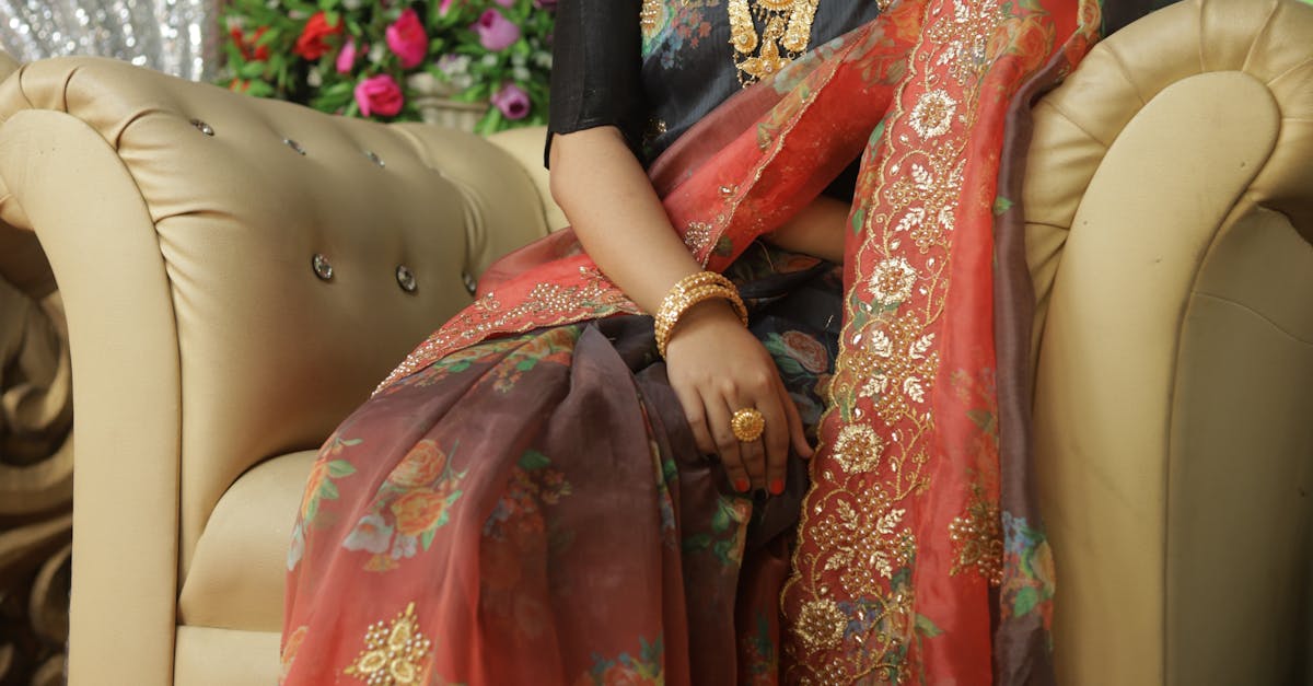 Braided Down Hairstyles with Floral Accents for Weddings